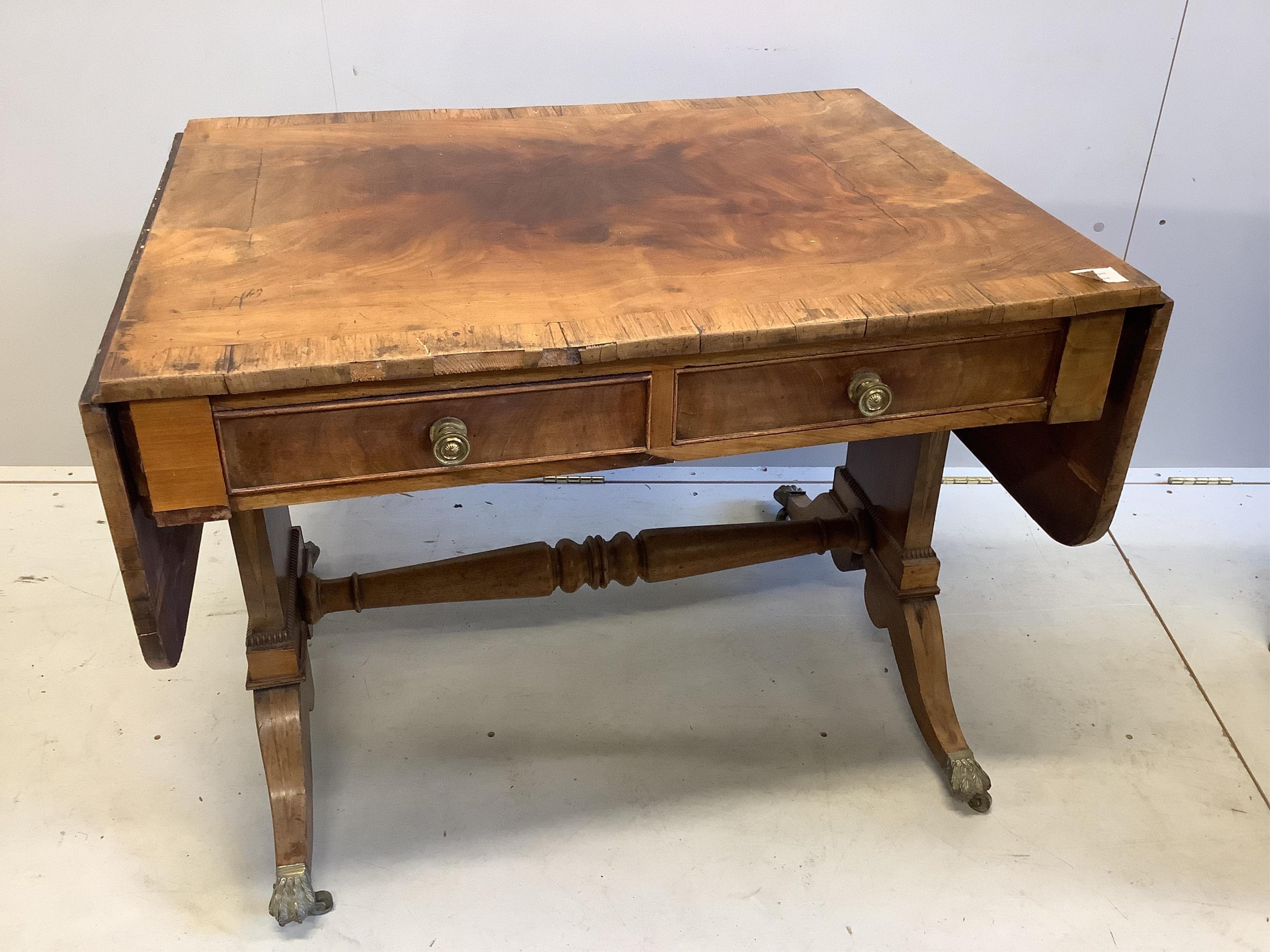 A Regency rosewood banded mahogany sofa table, width 92cm, depth 70cm, height 69cm. Condition - poor to fair